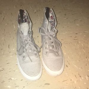 Vans high top sneakers.